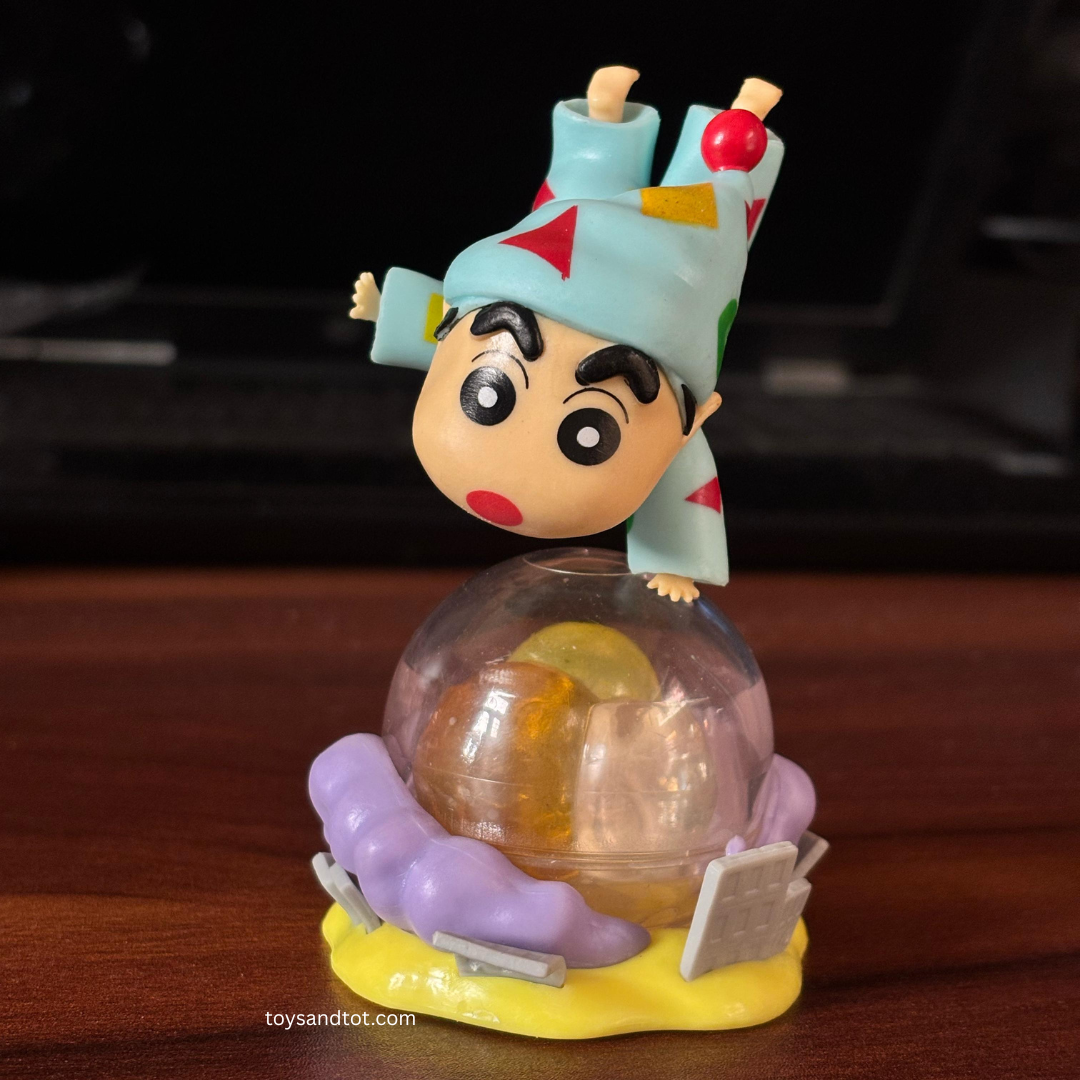 Shinchan Costume Miniature (Night Dress Costume on Globe )– A Fun & Playful Collectible!