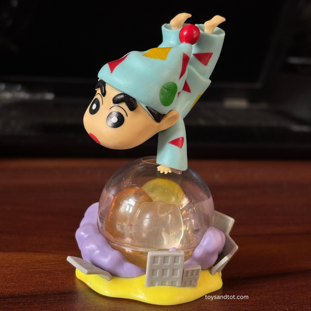 Shinchan Costume Miniature (Night Dress Costume on Globe )– A Fun & Playful Collectible!